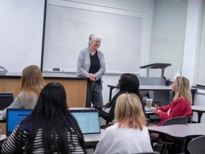 Dr. Marsha Fanning teaches in front of a class of students